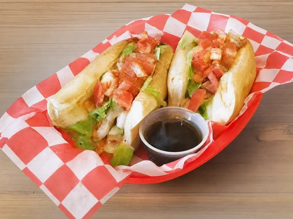 Grilled chicken subs with lettuce and tomato