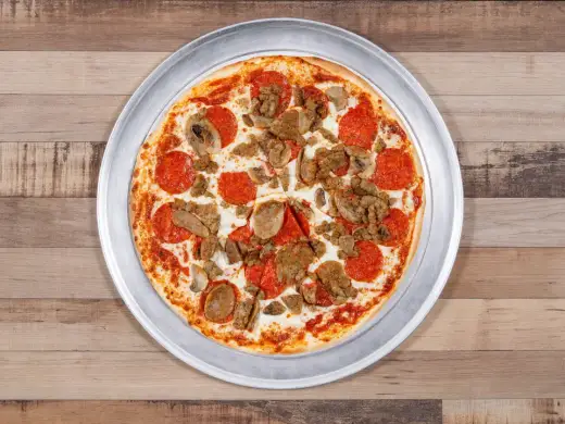 Meat Lovers pizza with pepperoni, meatballs, ham, and sausage